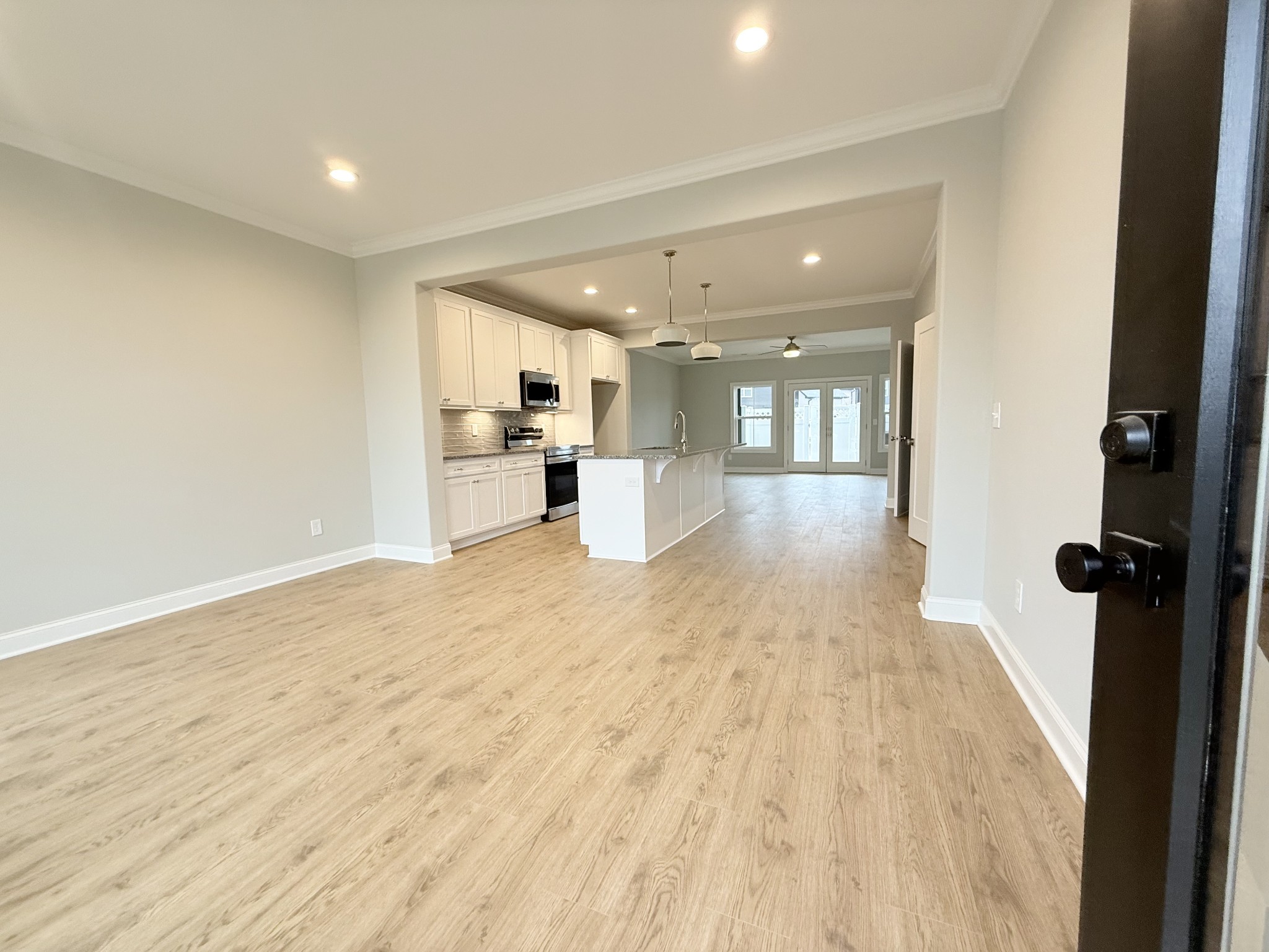 1365 Rebecca Johns Drive Murfreesboro, TN 37128 - Photo 21 of 31 a view of a big room with wooden floor and windows