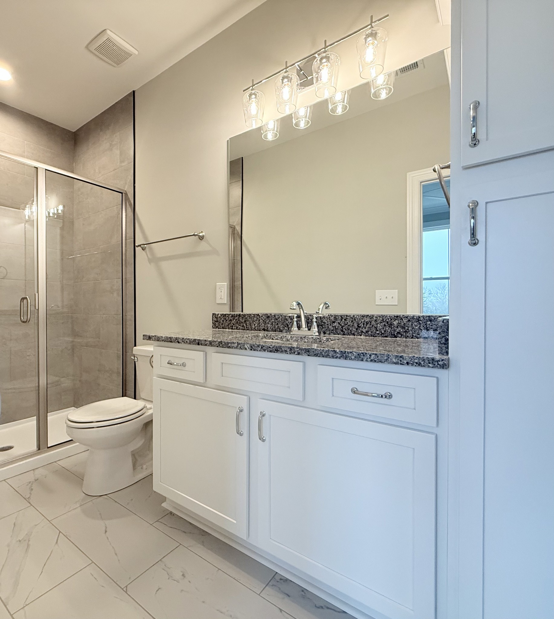 1365 Rebecca Johns Drive Murfreesboro, TN 37128 - Photo 6 of 31 a bathroom with a granite countertop sink a toilet and a mirror