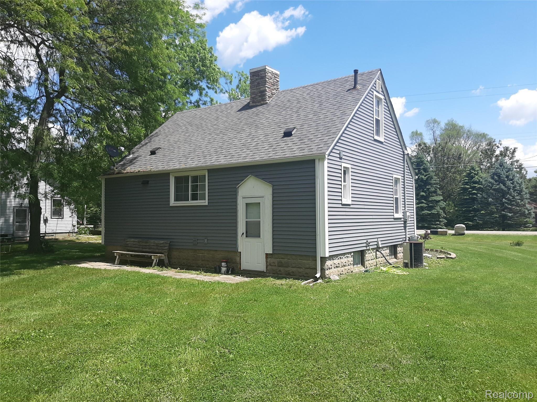 9197 Neff Road Clio, MI 48420 - Photo 2 of 19 Newer roof and siding