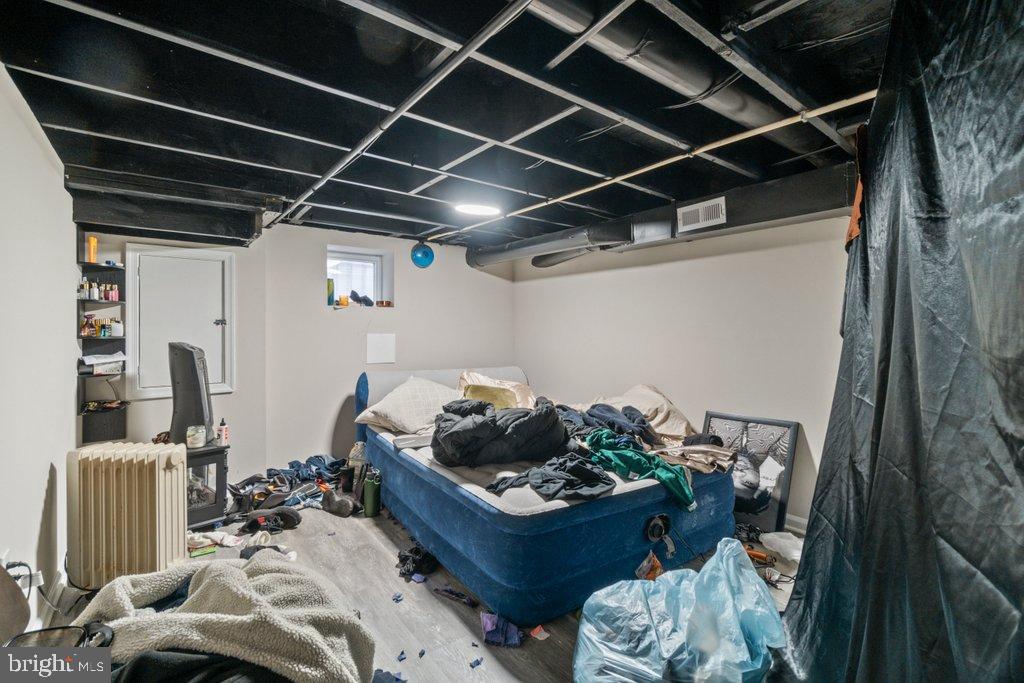 701 Baker Street Baltimore, MD 21217 - Photo 15 of 26 a room with furniture