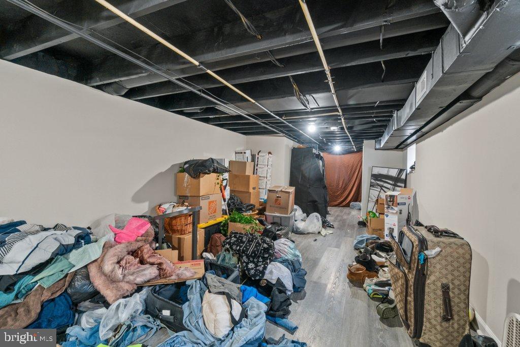 701 Baker Street Baltimore, MD 21217 - Photo 18 of 26 a view of gym equipment and children play room