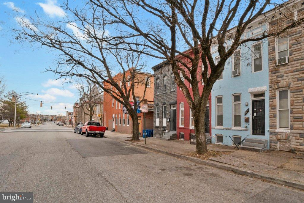 701 Baker Street Baltimore, MD 21217 - Photo 2 of 26 a view of road with a house