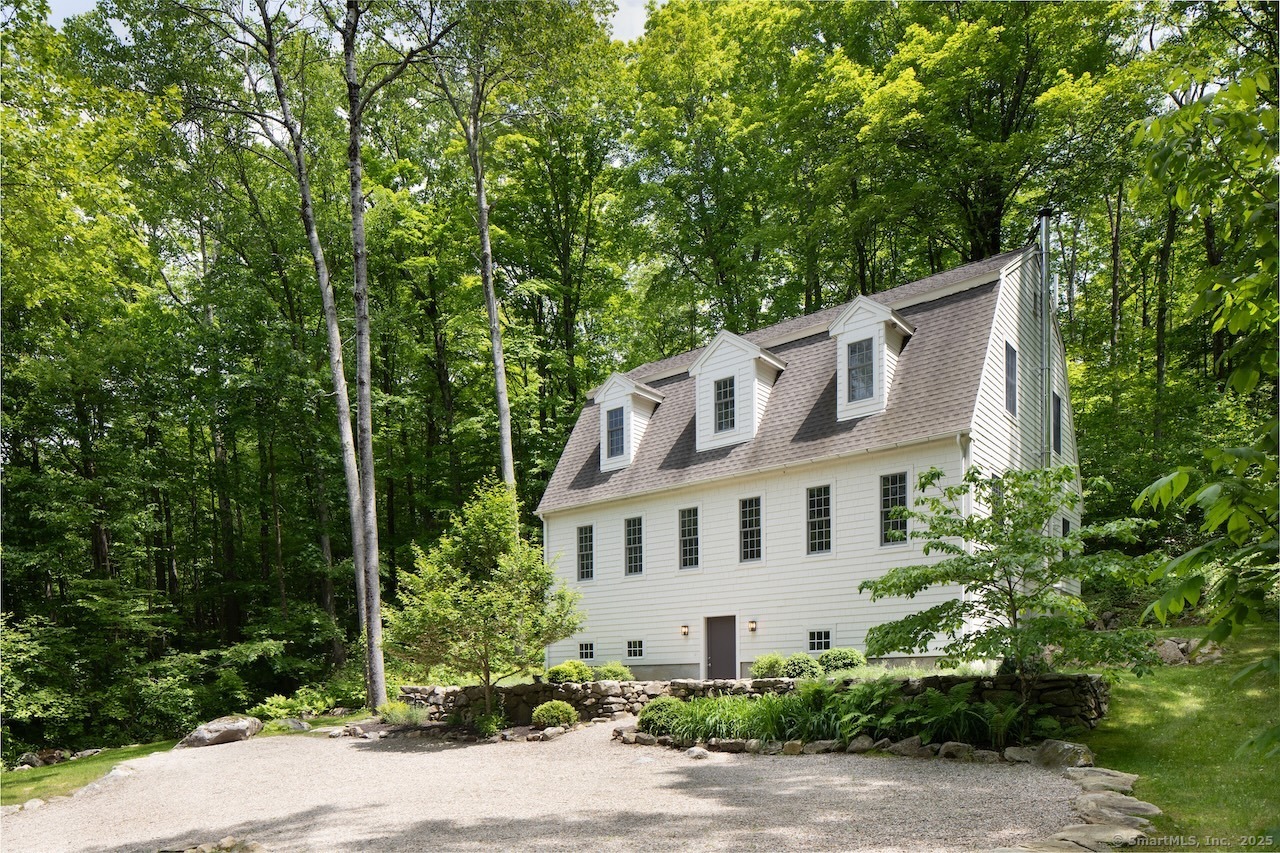 3 West Mountain Road Sharon, CT 06069 - Photo 1 of 23 a view of white house with a yard and garden