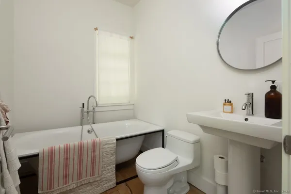 a bathroom with a sink and a toilet