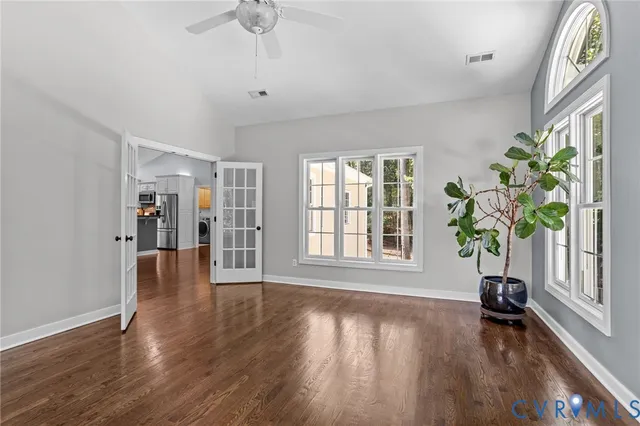 a view of livingroom with furniture window and wooden floor
