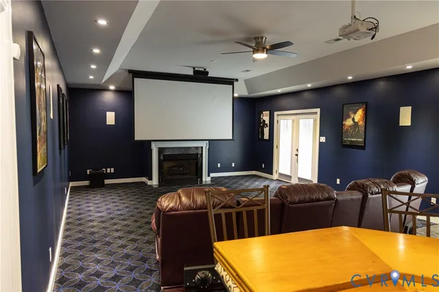 a large kitchen with sink a dining table and chairs