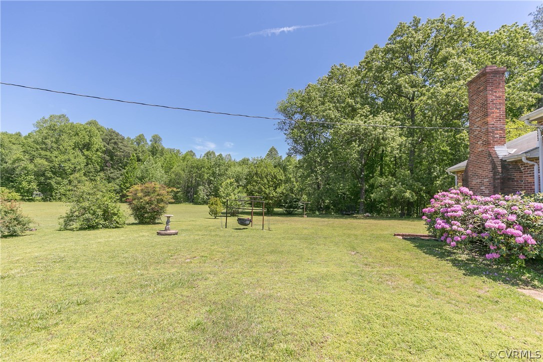 7339 Strath Road Henrico, VA 23231 - Photo 37 of 50 a view of a yard with an outdoor space