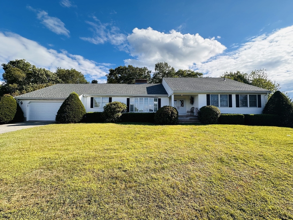 a front view of a house with swimming pool