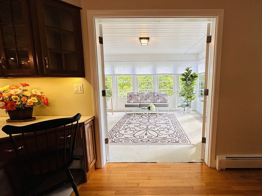 1107 Jackson Road Hardwick, MA 01037 - Photo 16 of 41 a view of a living room with a floor to ceiling window and wooden floor