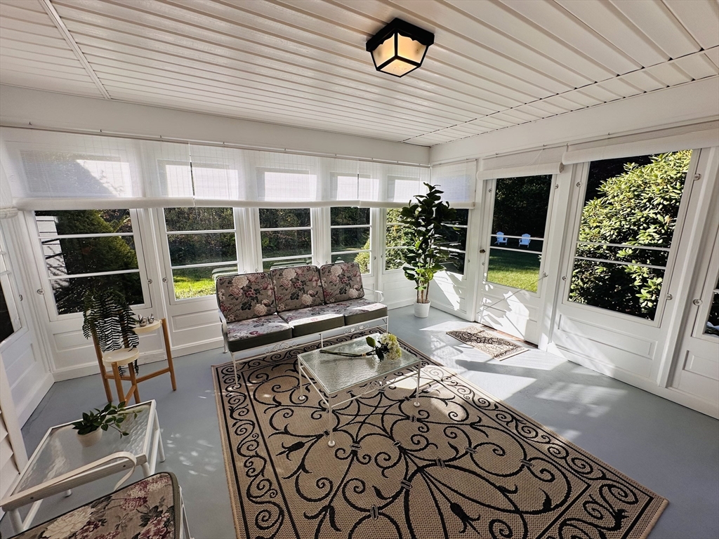 1107 Jackson Road Hardwick, MA 01037 - Photo 17 of 41 a living room with furniture floor to ceiling window and potted plant