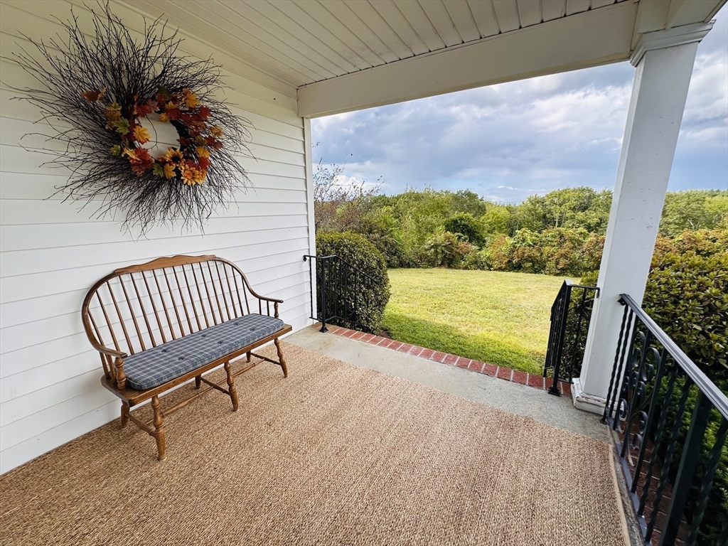 1107 Jackson Road Hardwick, MA 01037 - Photo 2 of 41 a view of a chair and table in the patio