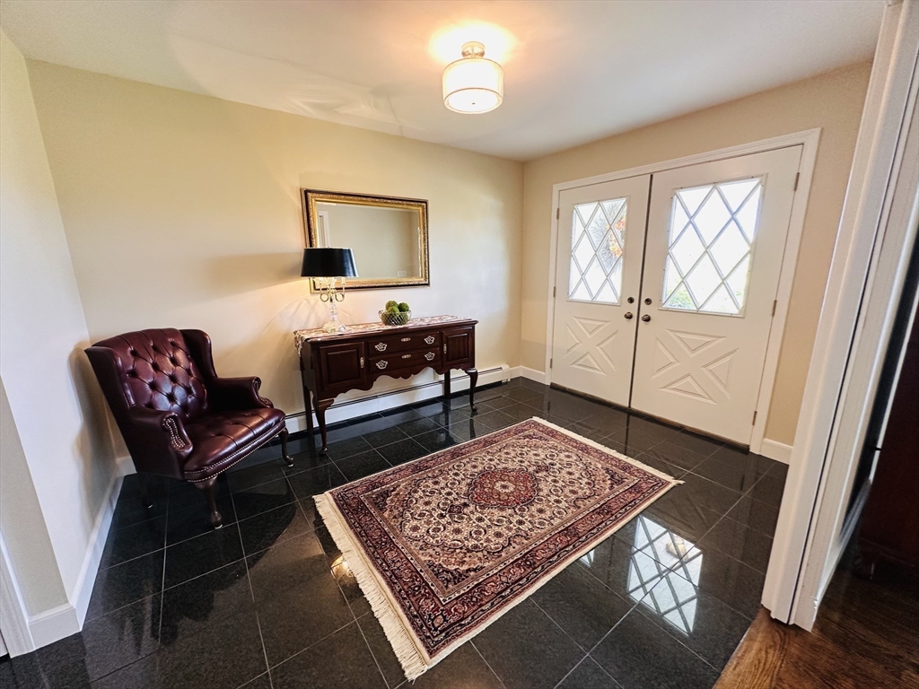 1107 Jackson Road Hardwick, MA 01037 - Photo 23 of 41 a living room with furniture rug and window
