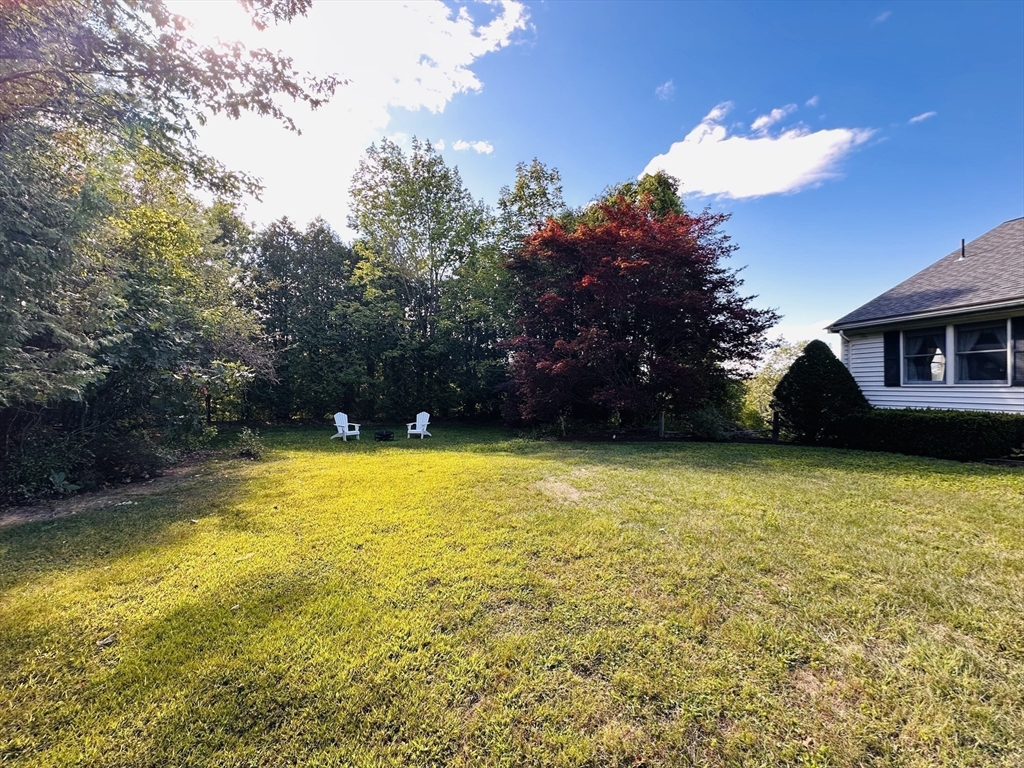 1107 Jackson Road Hardwick, MA 01037 - Photo 40 of 41 a view of a swimming pool with an outdoor space and seating area