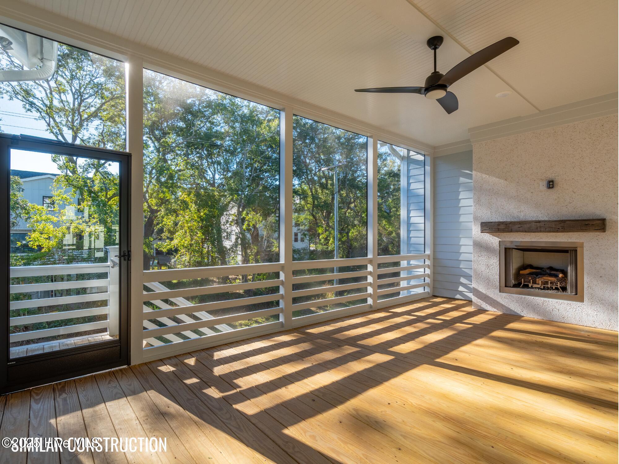 534 Sheldrake Court Beaufort, NC 28516 - Photo 7 of 36 Similar Screened Porch w/ Fireplace
