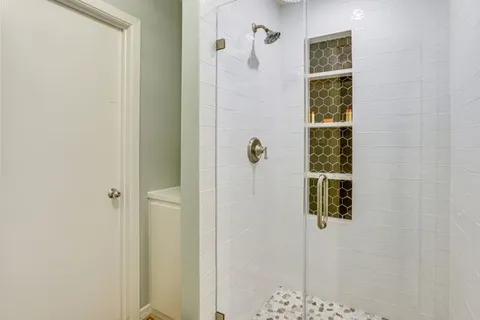 a bathroom with a sink a mirror and a toilet