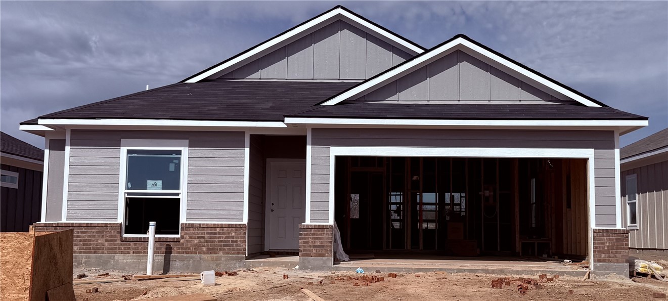 5504 Harriet Street Bryan, TX 77807 - Photo 1 of 5 a front view of a house with glass windows