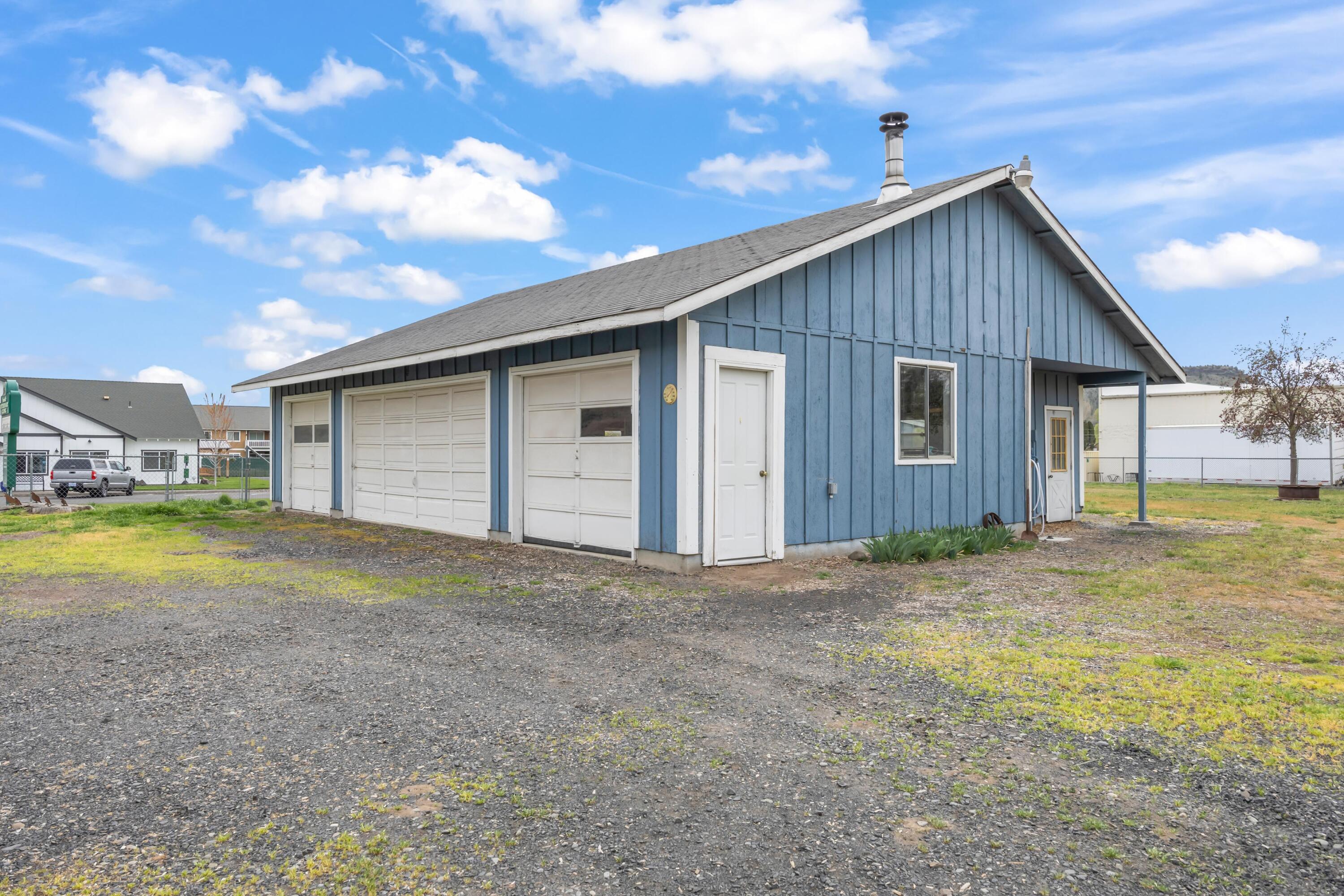 2010 Northeast Laughlin Road Prineville, OR 97754 - Photo 26 of 39 a view of backyard of house with garage
