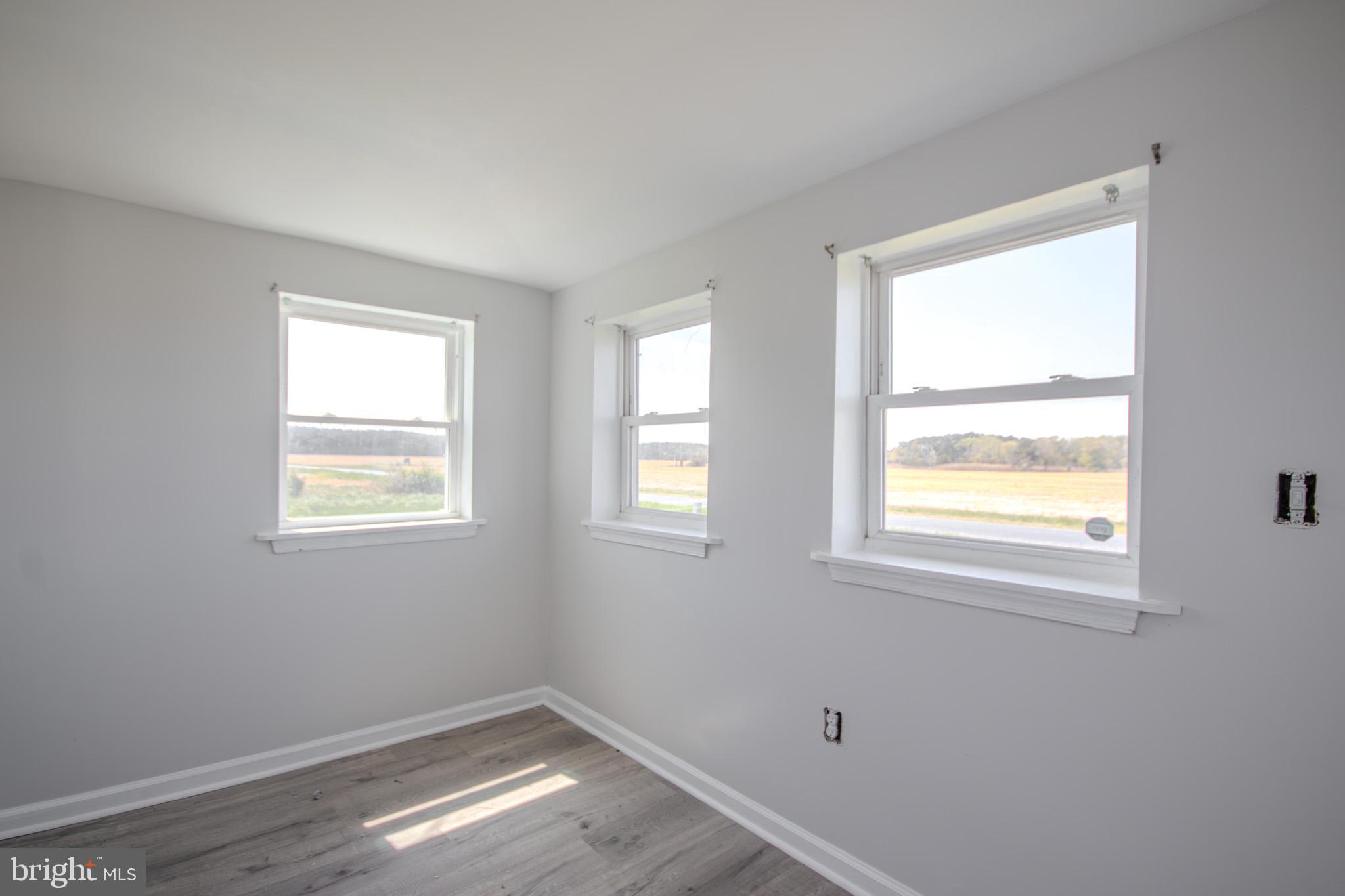 5693 Landon Store Road Marion Station, MD 21838 - Photo 6 of 20 an empty room with a window
