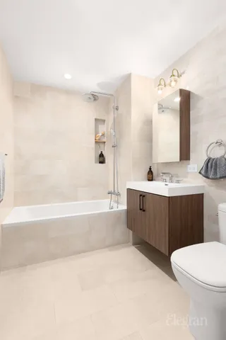 a view of a balcony with dining table and chairs