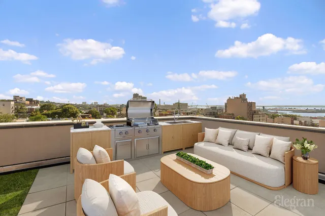 a view of a lake with couches