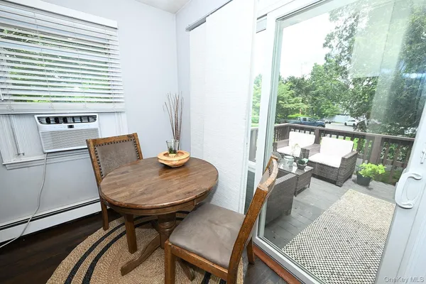 a view of a living room and dining room