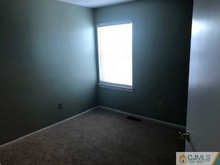 16 Renaissance Lane New Brunswick, NJ 08901 - Photo 11 of 18 an empty room with a window