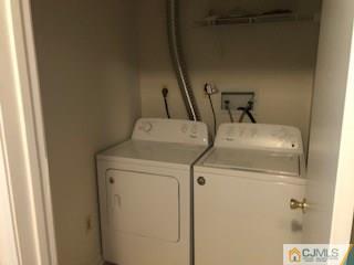 16 Renaissance Lane New Brunswick, NJ 08901 - Photo 9 of 18 a utility room with dryer and washer