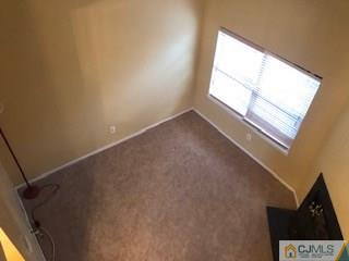 16 Renaissance Lane New Brunswick, NJ 08901 - Photo 10 of 18 an empty room with a window