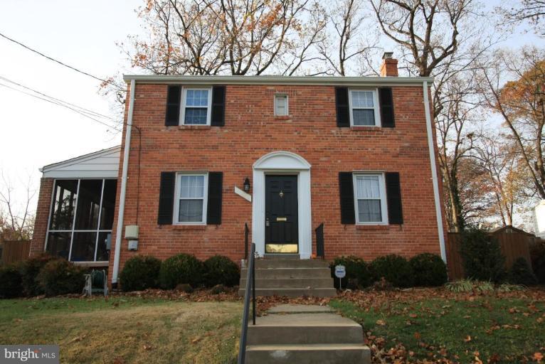 9924 Grayson Avenue Silver Spring, MD 20901 - Photo 12 of 26 a front view of a house with garden