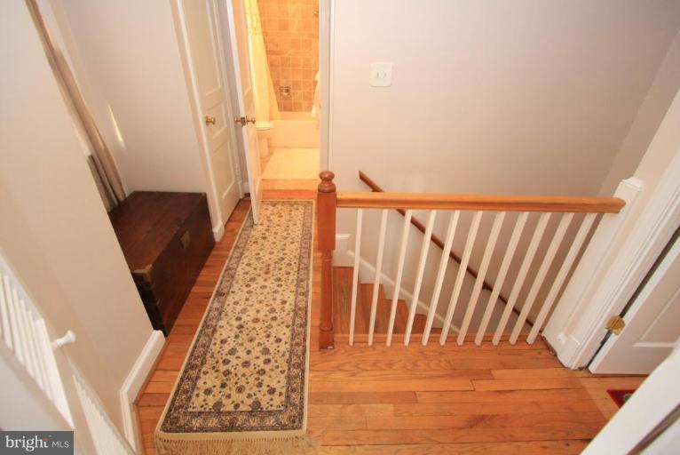 9924 Grayson Avenue Silver Spring, MD 20901 - Photo 13 of 26 a view of wooden floor in a room