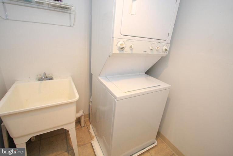 9924 Grayson Avenue Silver Spring, MD 20901 - Photo 17 of 26 a utility room with dryer and washer