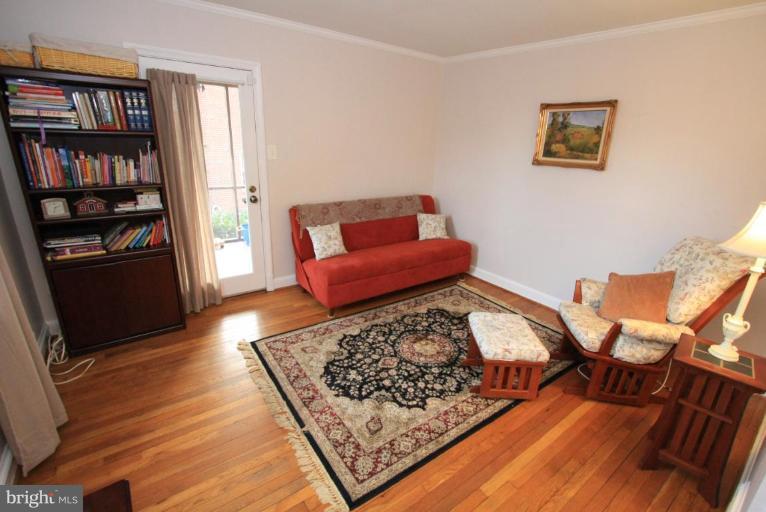 9924 Grayson Avenue Silver Spring, MD 20901 - Photo 18 of 26 a living room with furniture and a rug