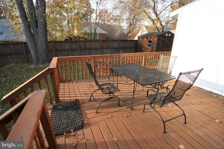 9924 Grayson Avenue Silver Spring, MD 20901 - Photo 5 of 26 a view of balcony with wooden floor and outdoor seating