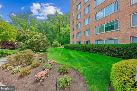 a view of a building with a garden