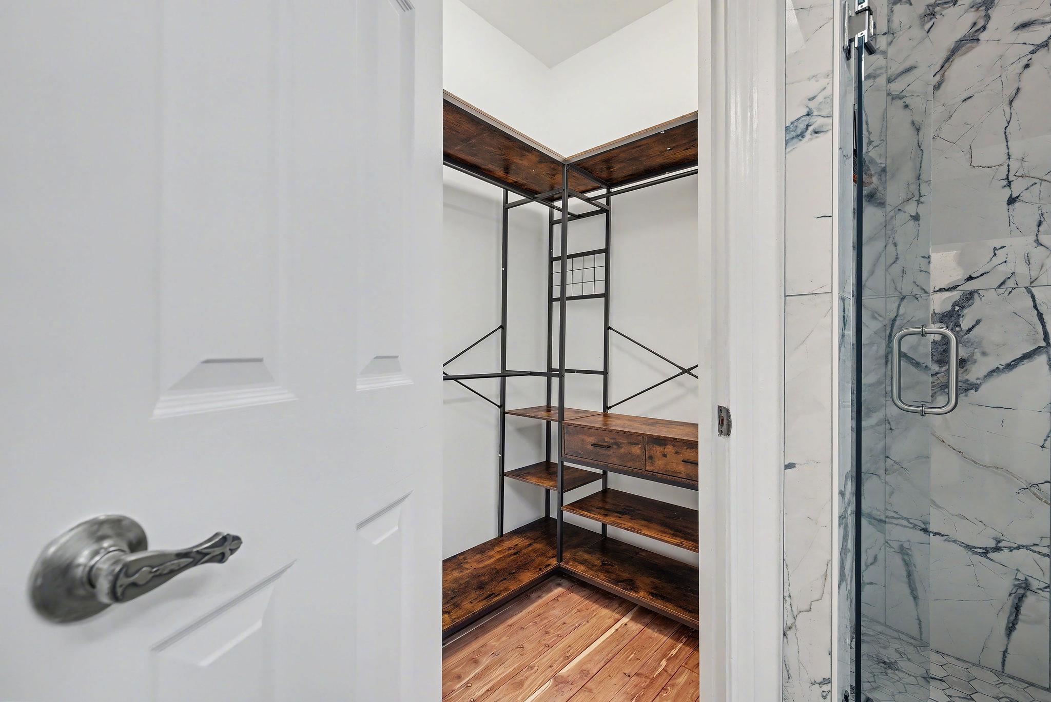 8431 Bazemore Road Cordova, TN 38018 - Photo 13 of 23 Walk in closet featuring aromatic cedar floors.