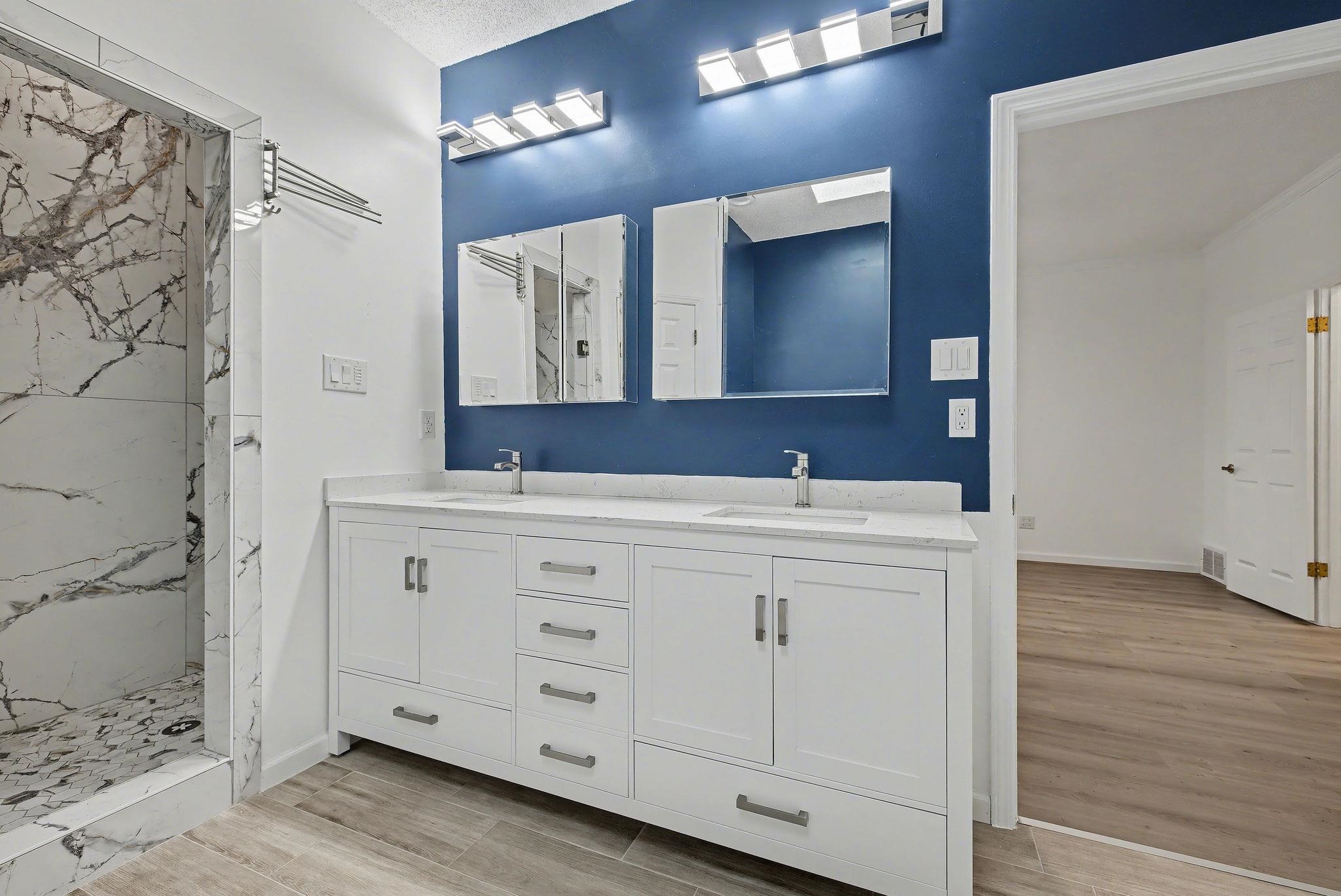 8431 Bazemore Road Cordova, TN 38018 - Photo 15 of 23 Bathroom with quartz double vanity, tile flooring, and a marble finish shower