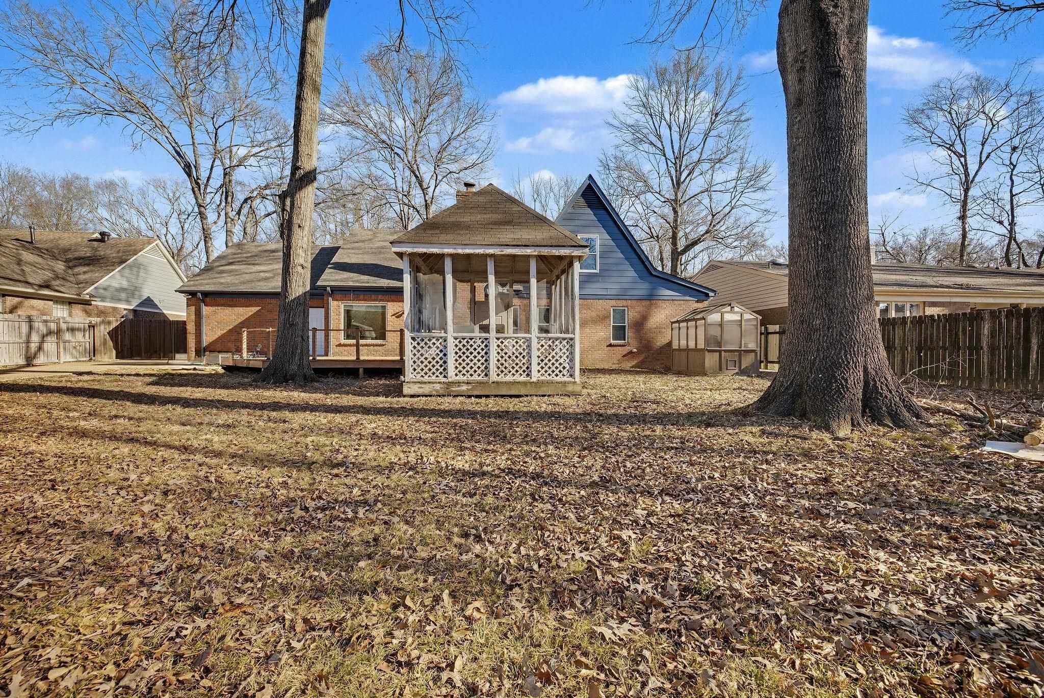 8431 Bazemore Road Cordova, TN 38018 - Photo 23 of 23 Back of house featuring a deck, greenhouse, and gazebo.