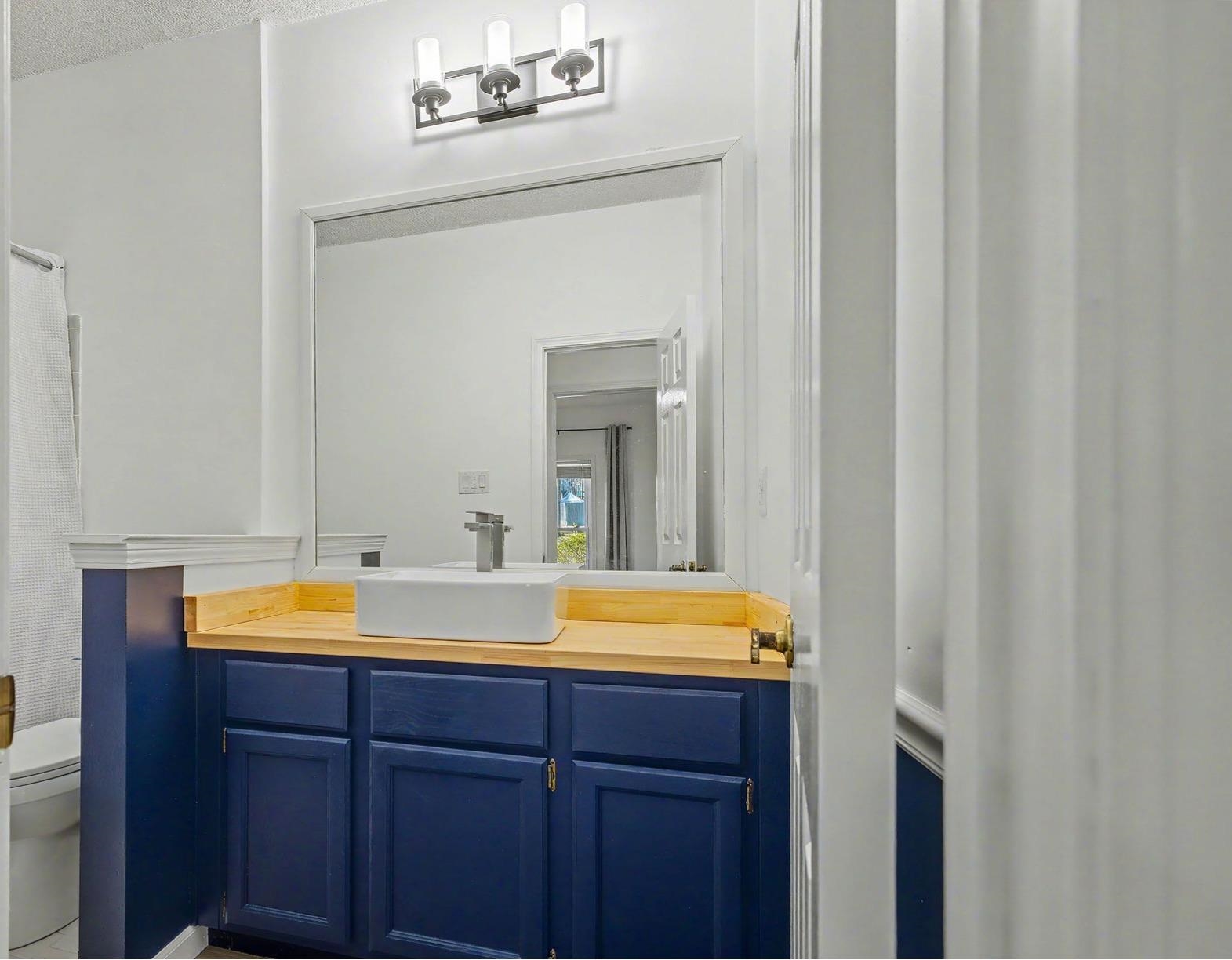 8431 Bazemore Road Cordova, TN 38018 - Photo 10 of 23 Full bath with vanity and a shower/tub.