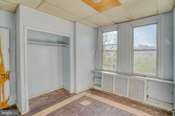 an empty room with windows
