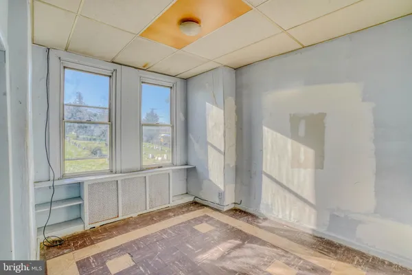 an empty room with windows