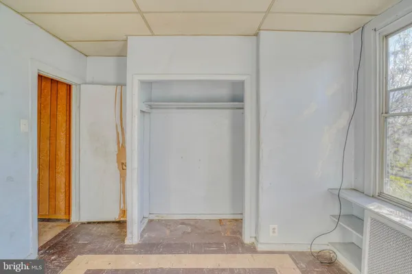 a view of an empty room with window