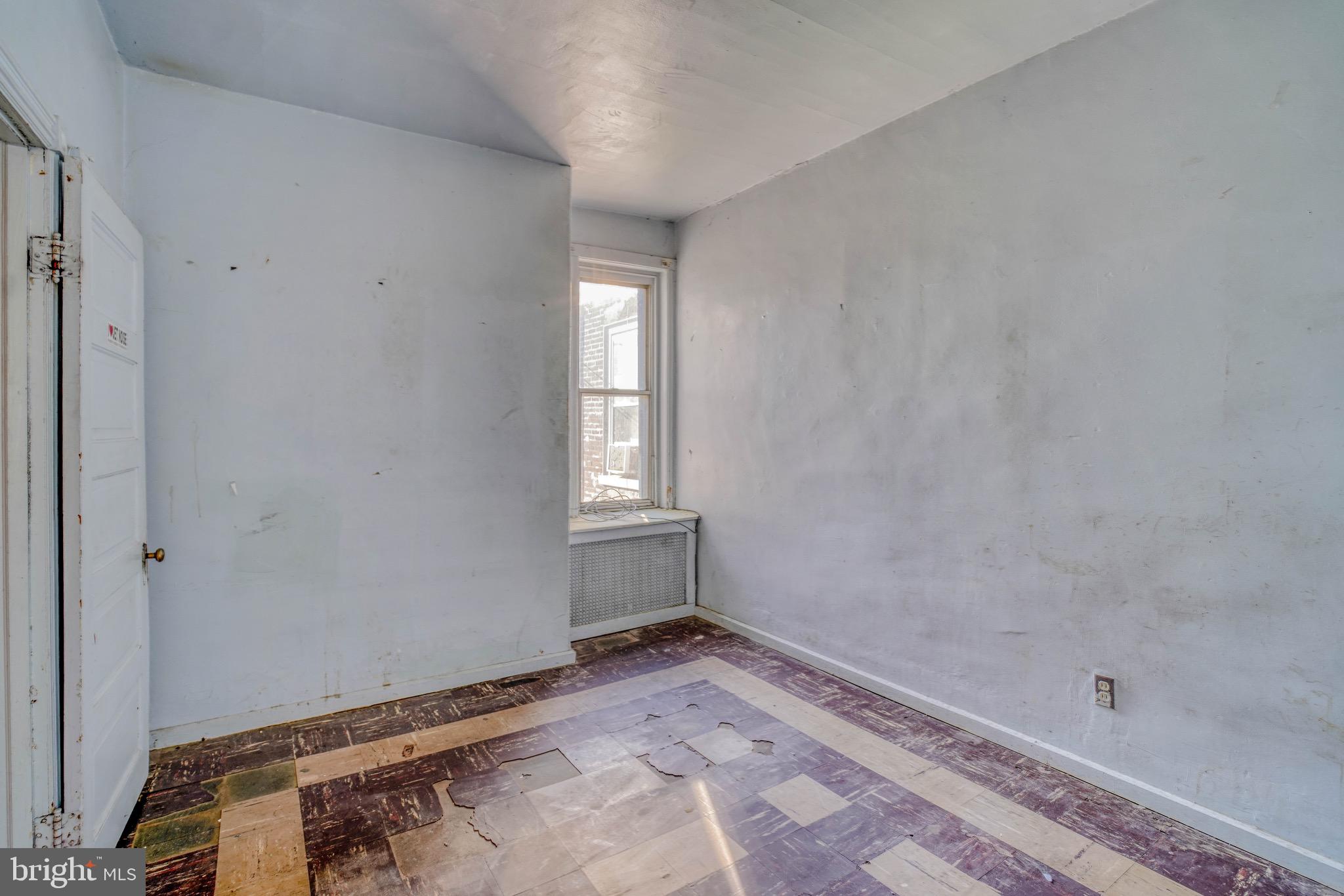 5705 Leonard Street Philadelphia, PA 19149 - Photo 28 of 30 a view of a room with wooden floor and windows