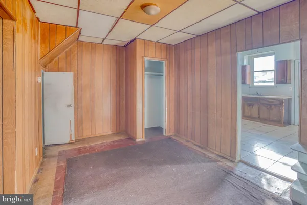 a view of a room with an entryway