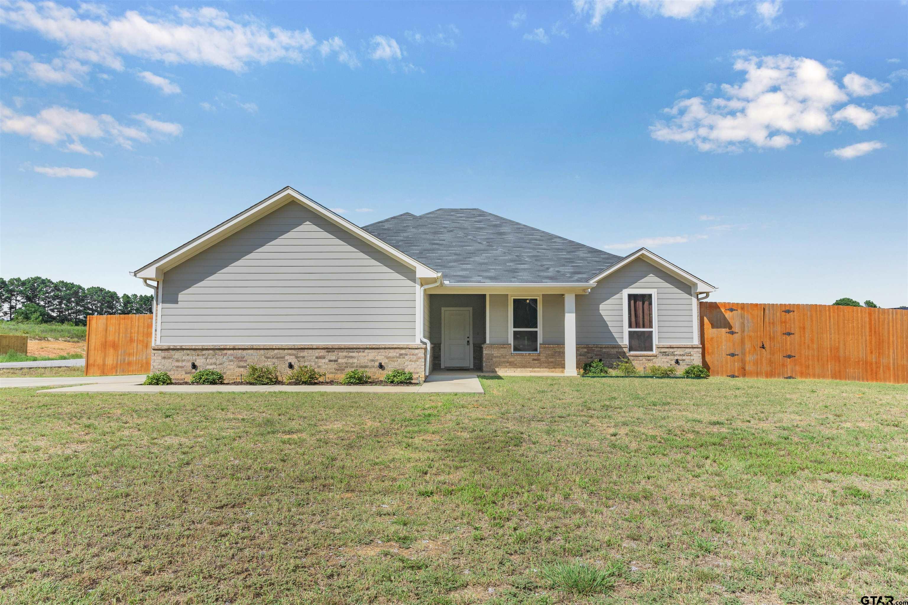 12908 County Road 46 Tyler, TX 75704 - Photo 2 of 24 a view of a house with a yard