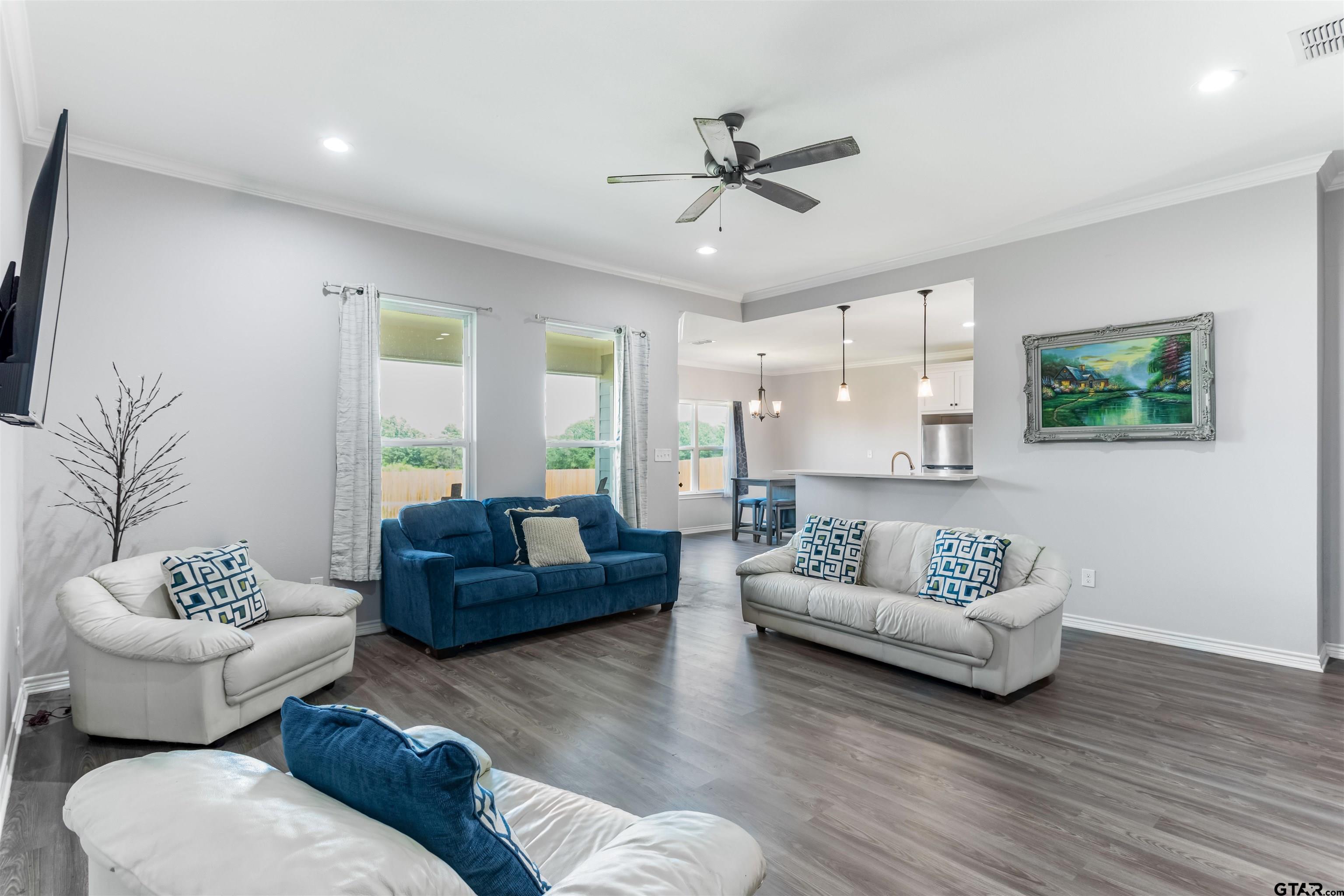 12908 County Road 46 Tyler, TX 75704 - Photo 9 of 24 a living room with furniture and a large window