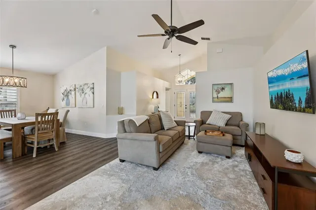 a view of a dining room with furniture window and refrigerator