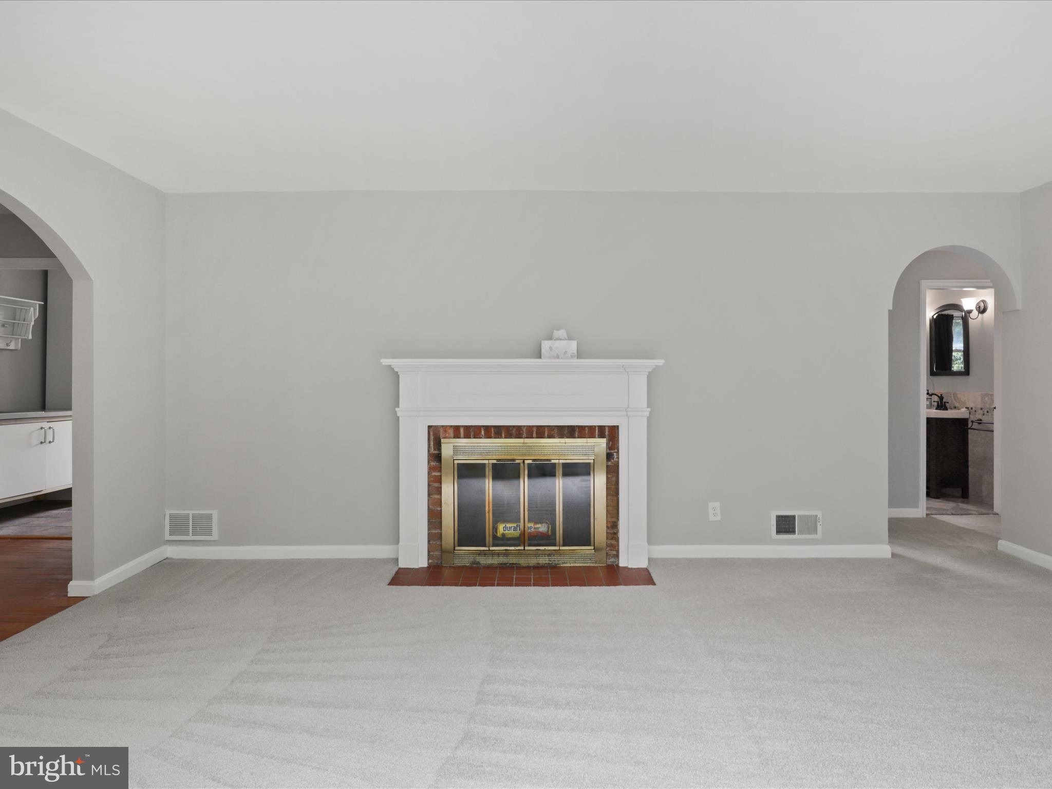 7533 Hollindale Court Alexandria, VA 22306 - Photo 21 of 78 Living room with bay window & w/b fireplace.