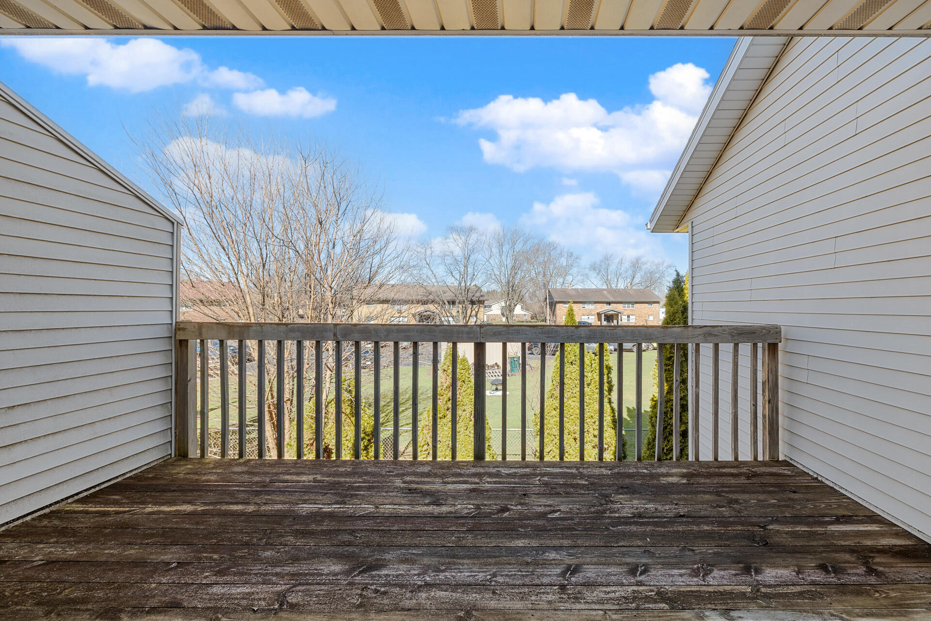 160 Maple Avenue South, Unit 6 Slinger, WI 53086 - Photo 13 of 17 Private Deck