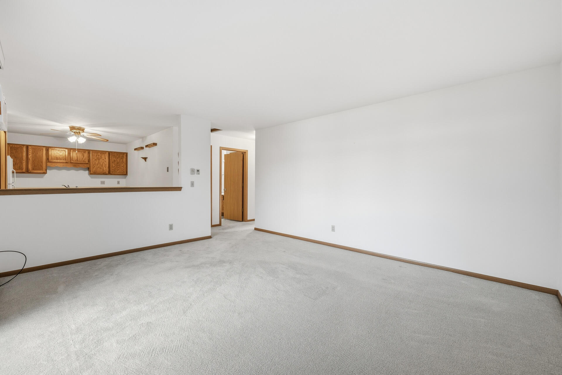 160 Maple Avenue South, Unit 6 Slinger, WI 53086 - Photo 6 of 17 Living Room