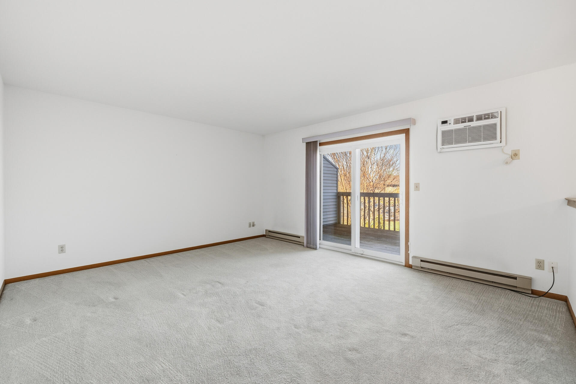 160 Maple Avenue South, Unit 6 Slinger, WI 53086 - Photo 8 of 17 Patio Door to Private Deck